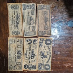 Vintage copies of Treasury Warrants from multiple States